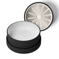 Thumbnail for Modern black and white ceramic food bowl for dogs and cats with tan silicone lick mat