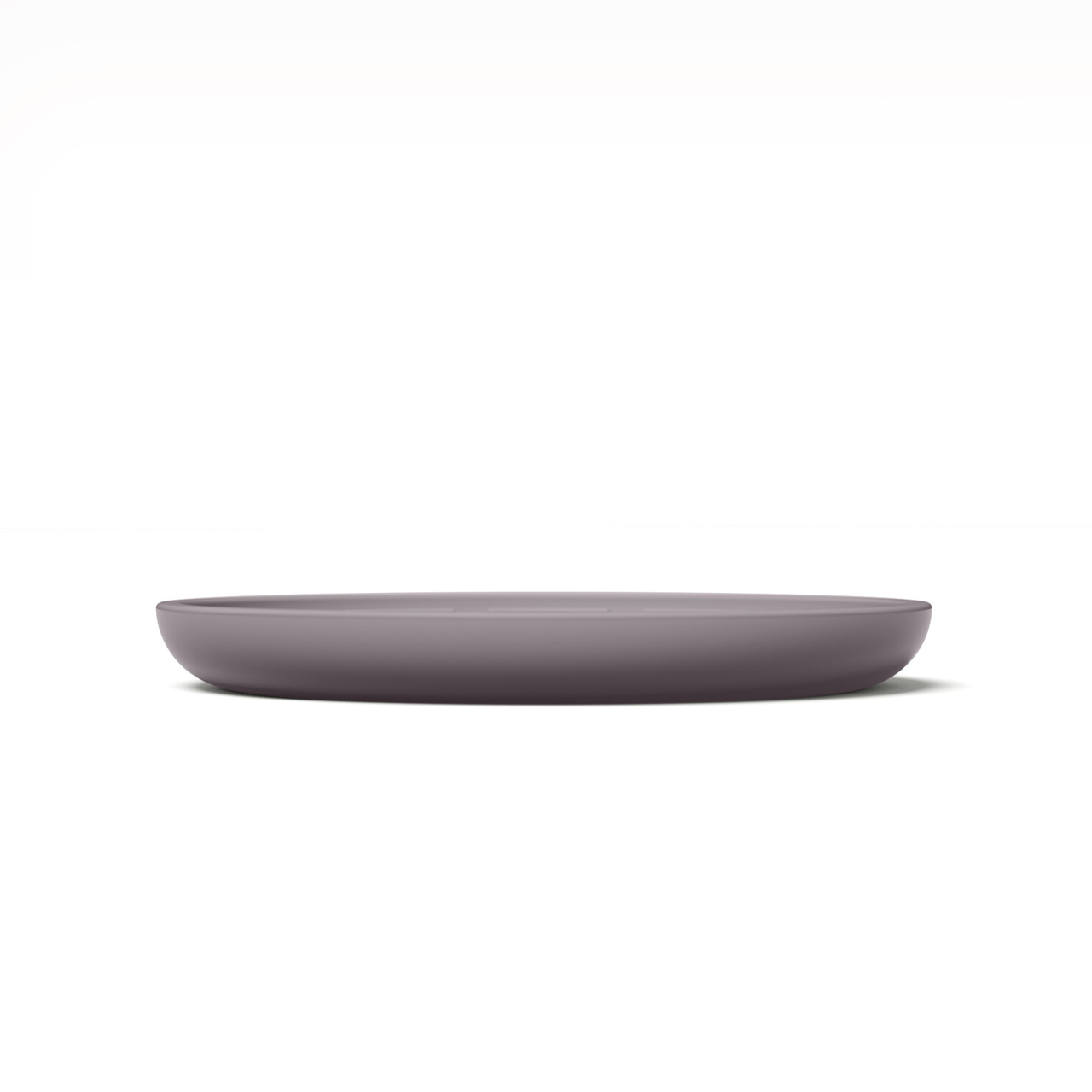 Circular modern lavender silicone lick mat designed for use with ceramic bowl for dogs and cats