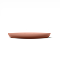 Thumbnail for Circular modern coral pink silicone lick mat designed for use with ceramic bowl for dogs and cats