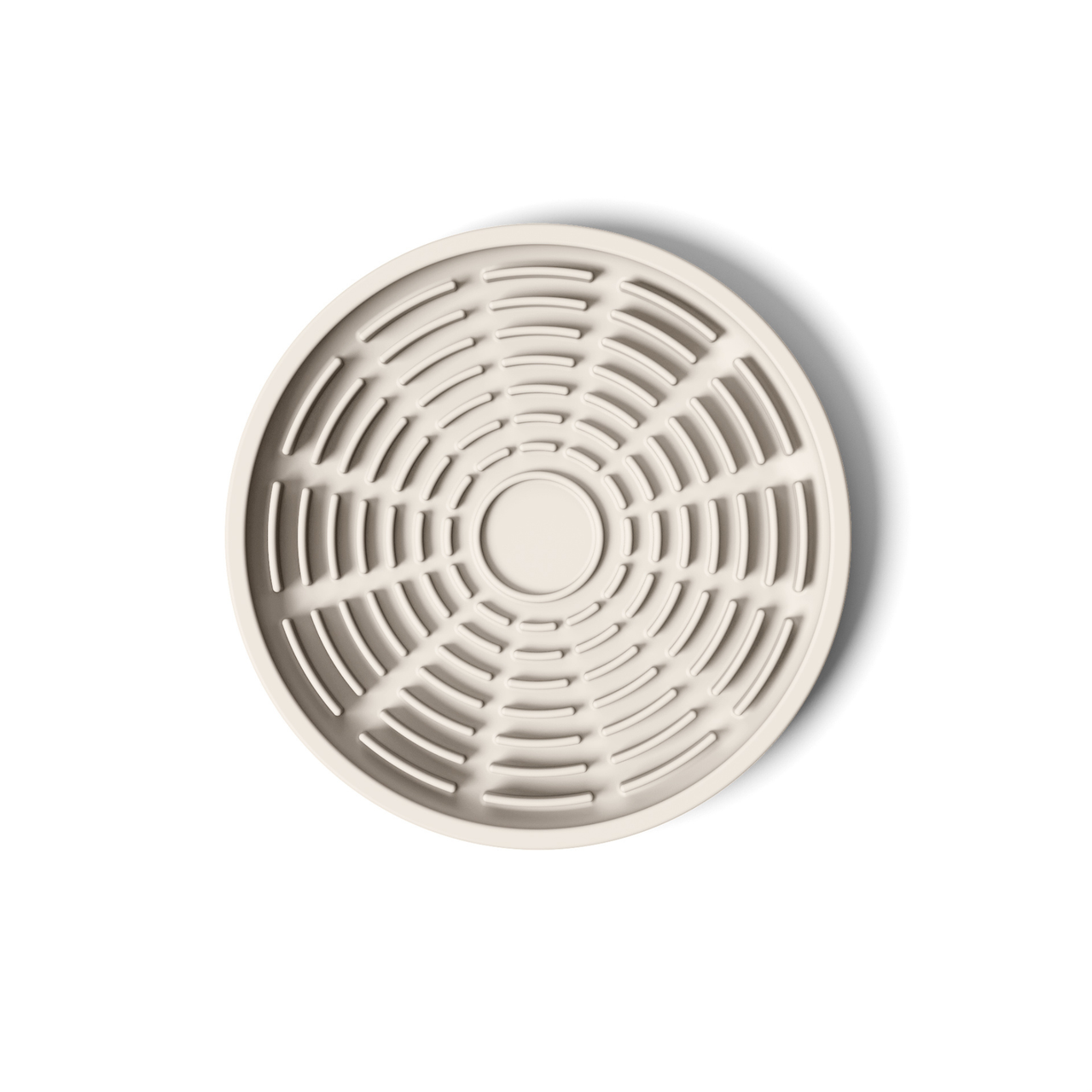 Circular modern tan silicone lick mat designed for use with ceramic bowl for dogs and cats