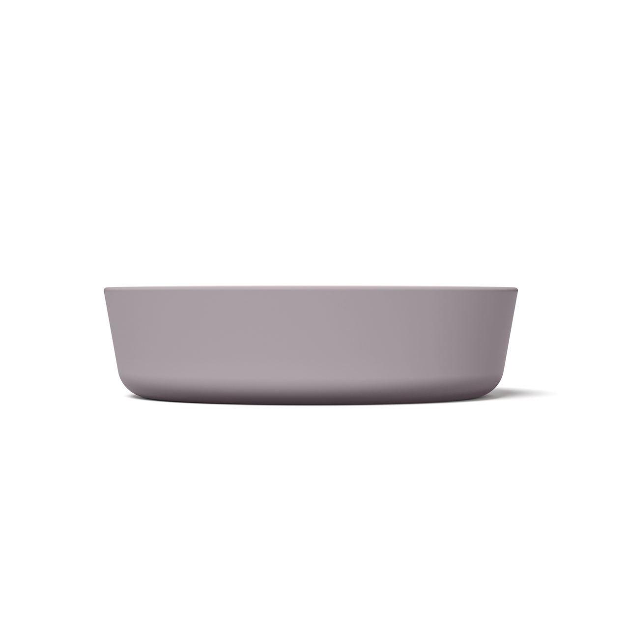 Dusty lavender minimalist circular silicone slow feeder designed to resemble grapefruit for dog use