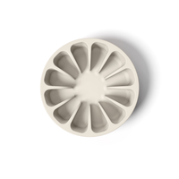 Thumbnail for Light tan minimalist circular silicone slow feeder designed to resemble grapefruit for dog use